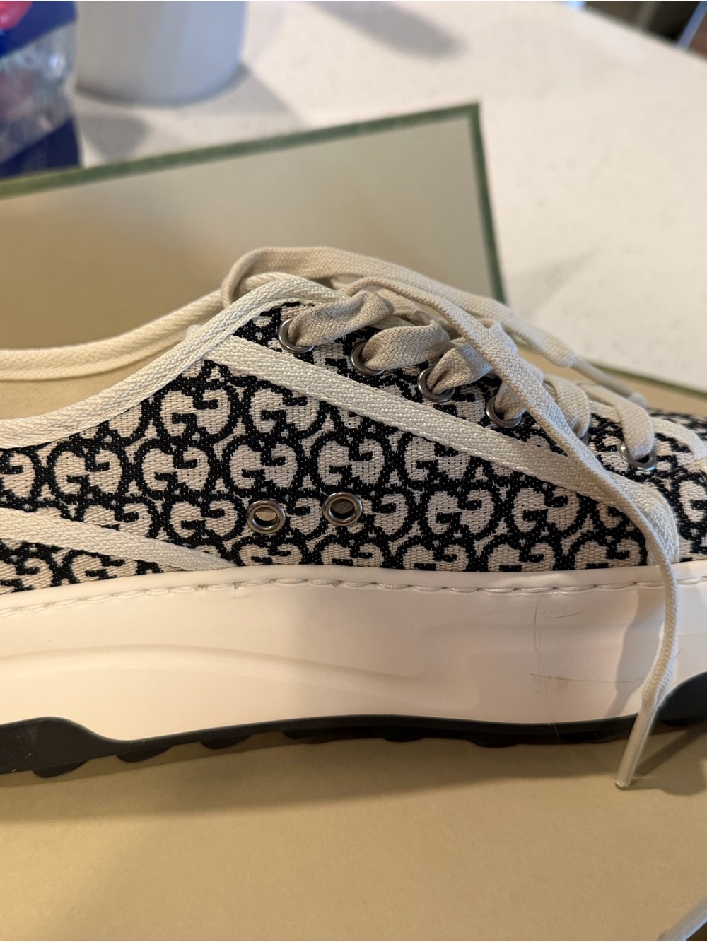 Gucci GG Canvas Low-Top Sneakers in Black & White - Picture 5 of 7